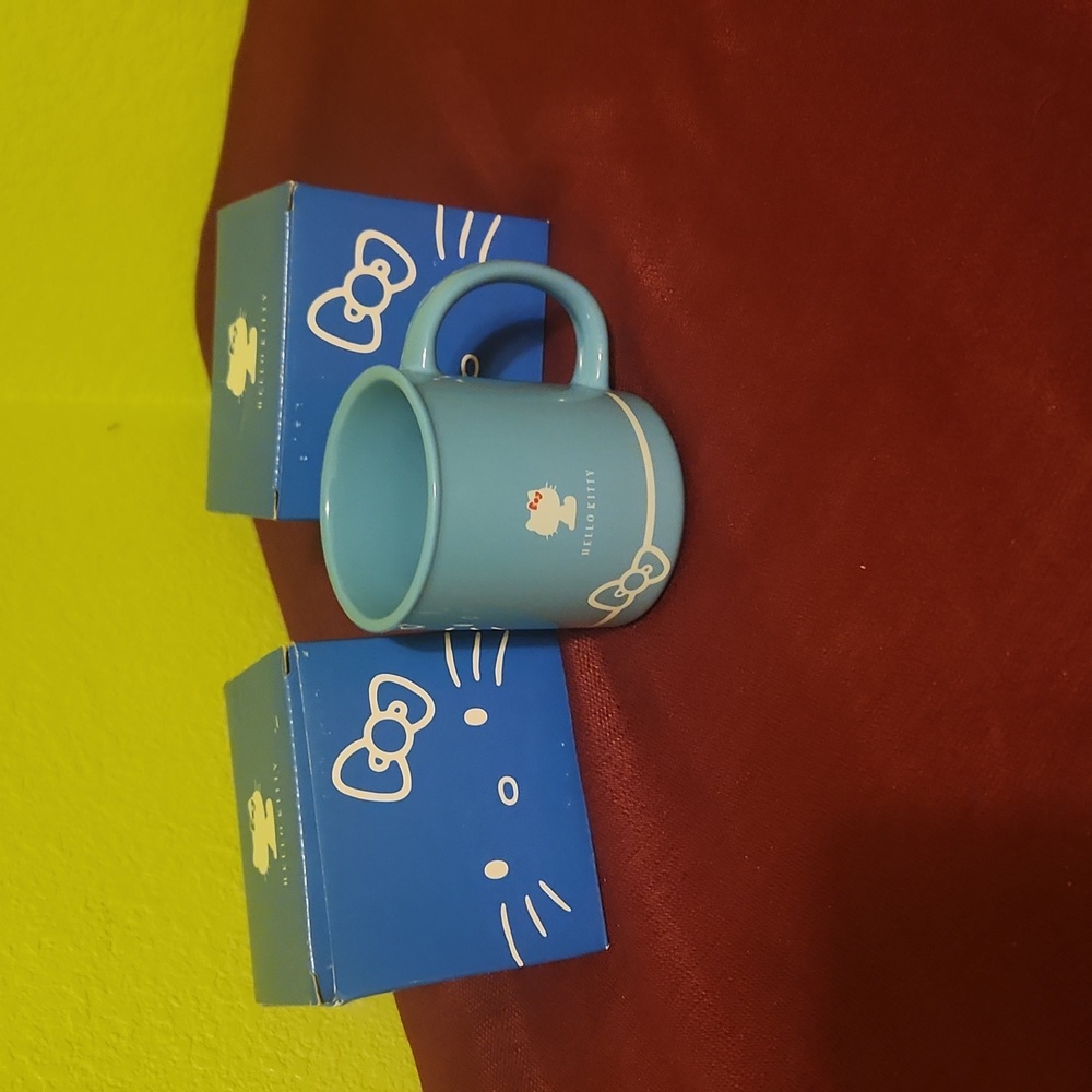 Pair of hello kitty mugs